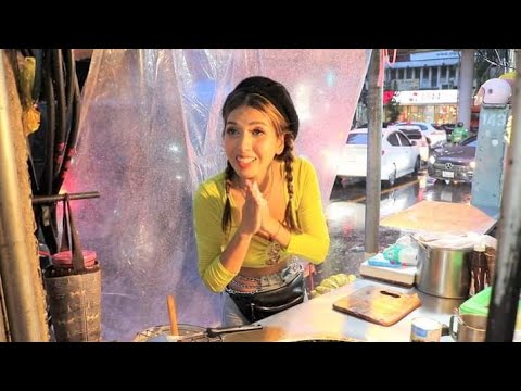 Hardworking Day Of Puy Roti Lady Working Under Heavy Rain fall - Thai street food.