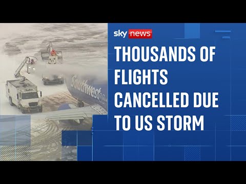 More than 17,000 US flights cancelled as major storm brings snow and ice