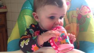 baby Sydney can use a sippy cup!