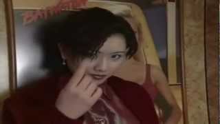 Vampire woman shows her fangs and want to bite a man