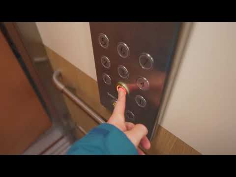 Sweden, Stockholm, Brandbergen, Tvillingarnas gata 330, KONE elevator - going down