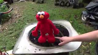 Cyborg Elmo burns to the Terminator 2 theme song
