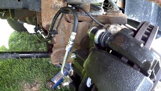 Dodge Ram 2500 Front Brake Caliper And Flex Line Removal Replace