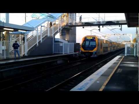 CityRail Millennium M Set Train arriving at and leaving Leumeah station