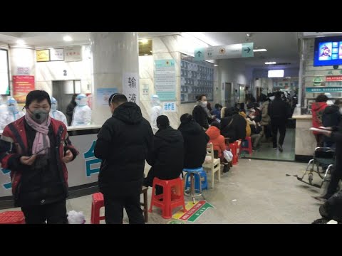 New China virus 'not as powerful as SARS' | AFP