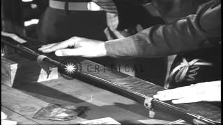 Officers discussing about the polishing of boots and waxing of skis in the United...HD Stock Footage