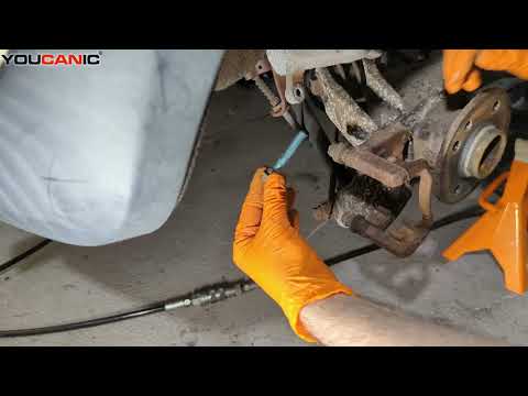How to Replace Rear Brakes and Rotor Disc on a 2002+ Mini Cooper