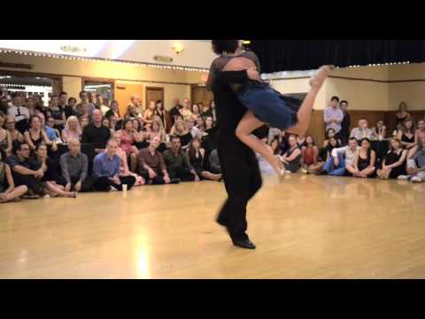  Donato Juarez  and  Carolina del Rivero  are  dancing  to  a  tango  at  Portland tango festival  in  2015