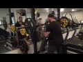 Antoine and friends train legs in Dorian's garage gym on a rainy day