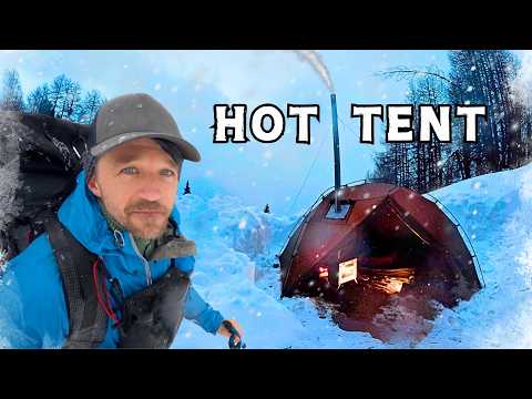 With tent stove in a snowstorm