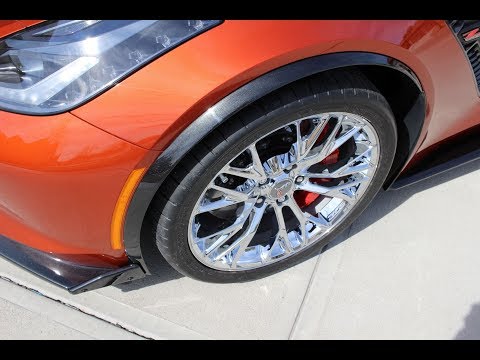 Installation of painted wheel opening moldings on the Z06 Corvette