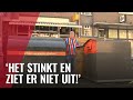 Restaurant heeft twee afvalcontainers op het terras