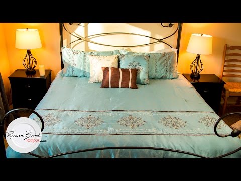 Part of a video titled How to Perfectly Make a Bed, Fast with EASY Tips - YouTube