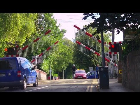 Level Crossing at Sydney Parade - 8520 and 8300 Class Dart Trains