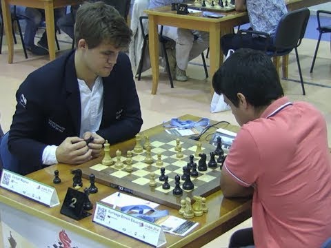 MAGNUS CARLSEN VS EDUARDO ITURRIZAGA | BLITZ CHESS 2014 - COMMENTARY BY DMITRIY KOMAROV