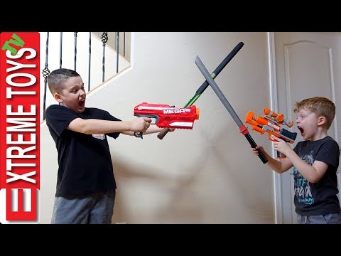 Ethan Vs. Cole Nerf Blasters and Nerf Sword Attack!