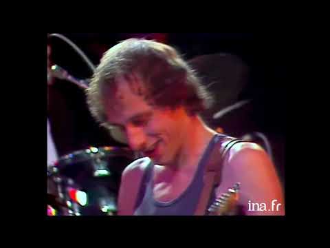 Videoclip de Eastbound Train (live) — Dire Straits