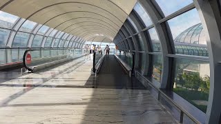 Walking to Jewel Changi Airport Link Bridge on Travelators