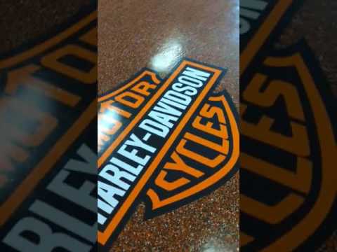 Harley Davidson Epoxy Flake Floor Garage by Paradigm Decorative Concrete and Flooring