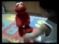 Andre Playing With Tickle Me Elmo