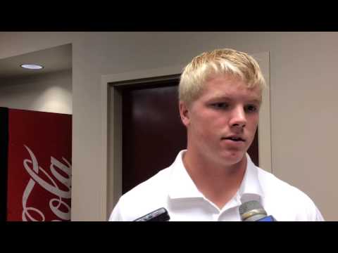 Ethan Wolf talks to the press after his first career game