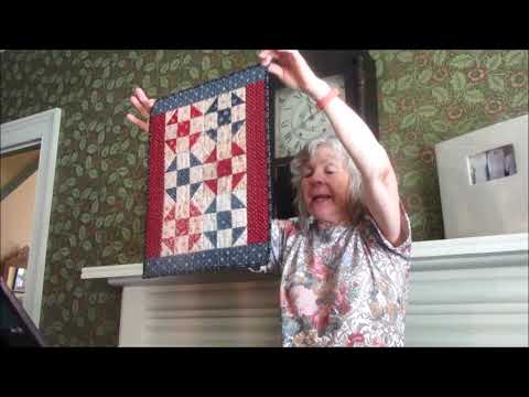 Ellie Held shows her quilts