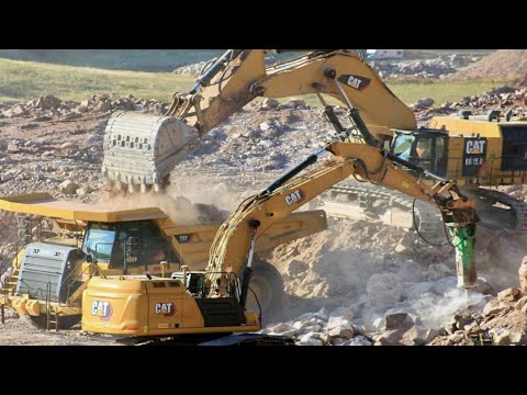 Liebherr 954, 934 And Caterpillar 385C Excavators Working With Hydraulic Hammers.