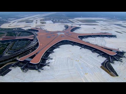 شاهد الصين تفتتح أحد أكبر المطارات في العالم قبل أيام من الاحتفال بتأسيس النظام الشيوعي…