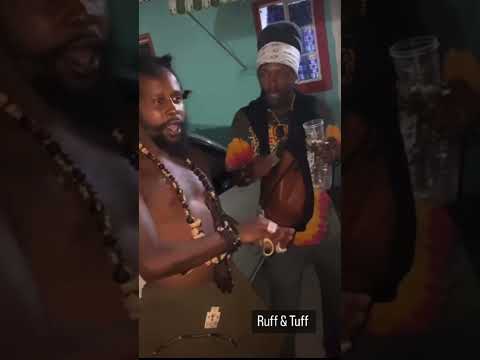 Popcaan and Iwayne outside 🤘🏾