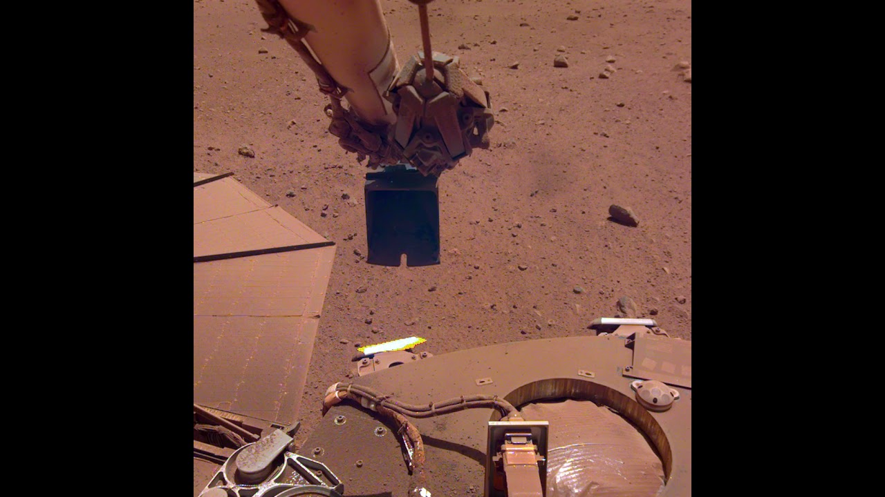 InSight's Robotic Arm Trickles Sand in the Wind - YouTube