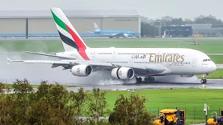 (4K) WET and WINDY Plane spotting day at Amsterdam Schiphol - Spray and close-up take-offs!