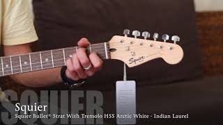 Video thumbnail for Squier Bullet® Strat With Tremolo HSS Arctic White Indian Laurel & Blackstar ID Core Stereo 10 V2 by MyDukkan