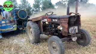 Old Fiat 480 showing a pto power on wheat thrasher