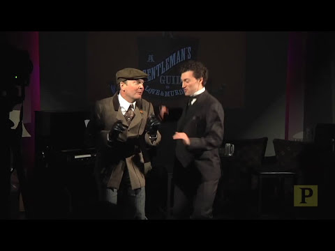 Preview still highlighting patter duet staging and period set pieces