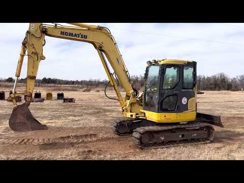Part of a video titled Pattern Control Change - Komatsu PC88MR Excavator - YouTube