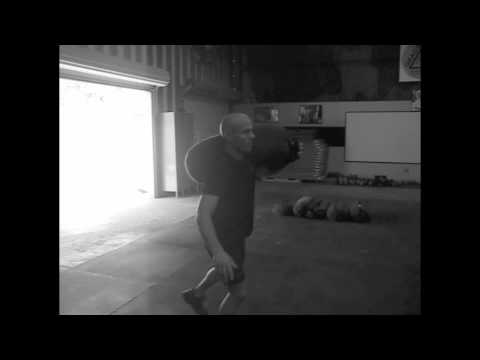 Sandbag Walking Lunge