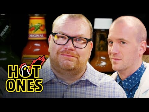 Superfan Brett Baker Grills Sean Evans Over Spicy Wings | Hot Ones