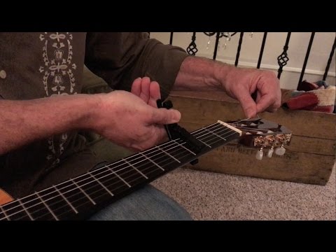 String changing hack - using a capo to make string changes easier on guitar, mandolin, etc.