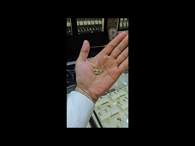 (فرع المارينا) تعليقه ذهب عيار 18 الوزن 4.88  جرام