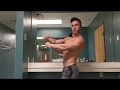 Flexing bodybuilding men's physique after arm day