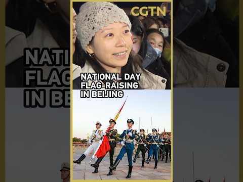 Why do people wait all night to watch China's National Day flag-raising?