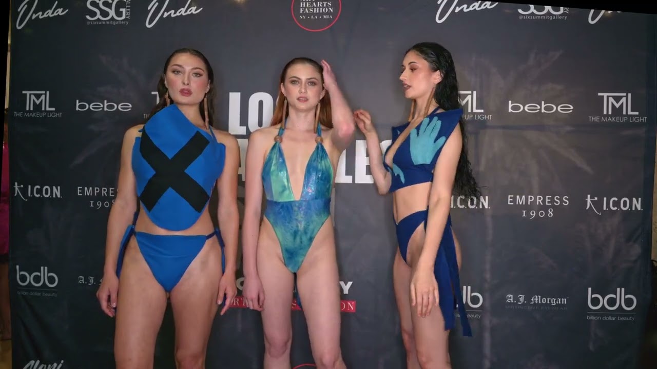 Models Gianna Kailani Jayden pose backstage at ArtHeartsFashion LAFW wearing "nopunchingbag"