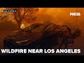 Drivers ditched vehicles to escape the Palisades Fire in Southern California.mp4