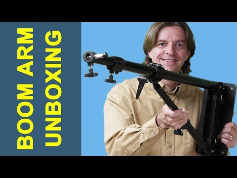 Unboxing an Impact 7' wall-mounted boom arm for photography studio equipment