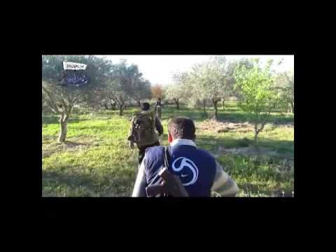 توجه عناصر لواء هنانو لرمي صاروخ كونكورس في جبل التركمان في ريف اللاذقية