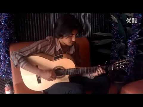 Tarim, Uyghur Flamenco Guitarist shawket.Guitarrista flamenco uyghur. Tarim music, folk music.