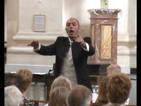 Ghassan Alaboud conducting the choir