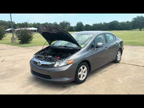 2012 Grey /GRAY Honda Civic CNG (19XFB5F53CE) with an 1.8L L4 SOHC 16V CNG engine, 5-Speed Automatic transmission, located at 17760 Hwy 62, Morris, OK, 74445, (918) 733-4887, 35.609104, -95.877060 - 2012 HONDA CIVIC DEDICATED CNG (RUNS ONLY ON COMPRESSED NATURAL GAS) HAS A 1.8L 4 CYLINDER ENGINE AND IS 2WD. FEATURES MANUAL SEATS, POWER LOCKS, POWER MIRRORS, POWER WINDOWS. HAS AM/FM RADIO, CD PLAYER, AUX PORT, NAVIGATION, CRUISE CONTROL, MULTI-FUNCTION STEERING WHEEL CONTROL, HANDS FREE CALLING - Photo#27