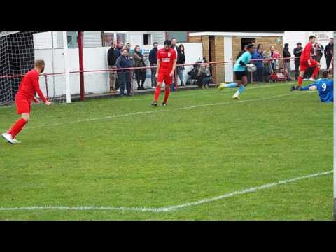 FLACKWELL'S WILLMENT SHOVES COCKFOSTERS' VAROUXAKIS TO THE GROUND BUT NO PENALTY IS AWARDED