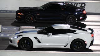 Mustang crashes racing against Corvette